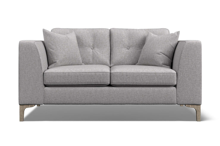Gray sofa with cushions on a white background
