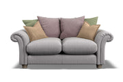 Gray sofa with colorful cushions on a white background
