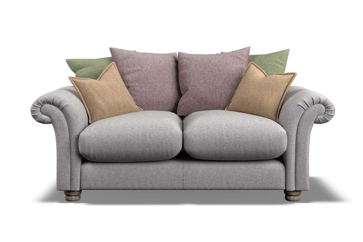 Gray sofa with colorful cushions on a white background